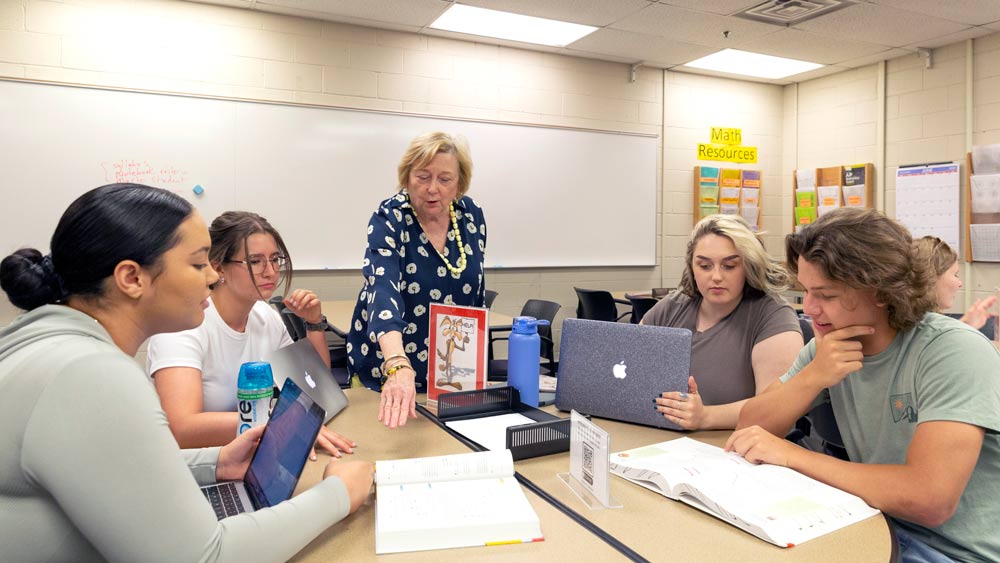 OCC counselor working with students