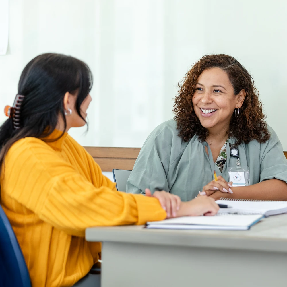 a counselor talking to a student