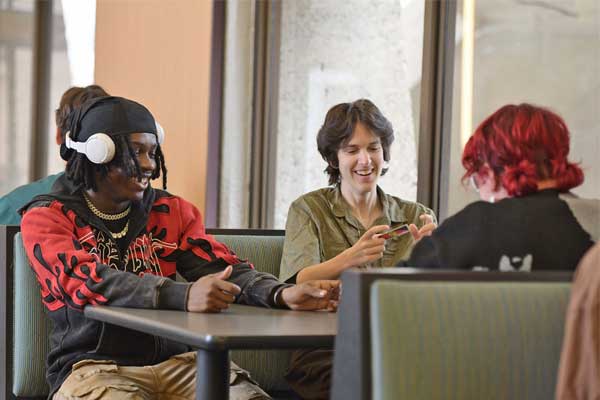 Students sitting at a table.