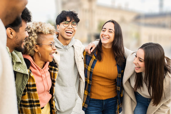 Stock image of some students huddled together