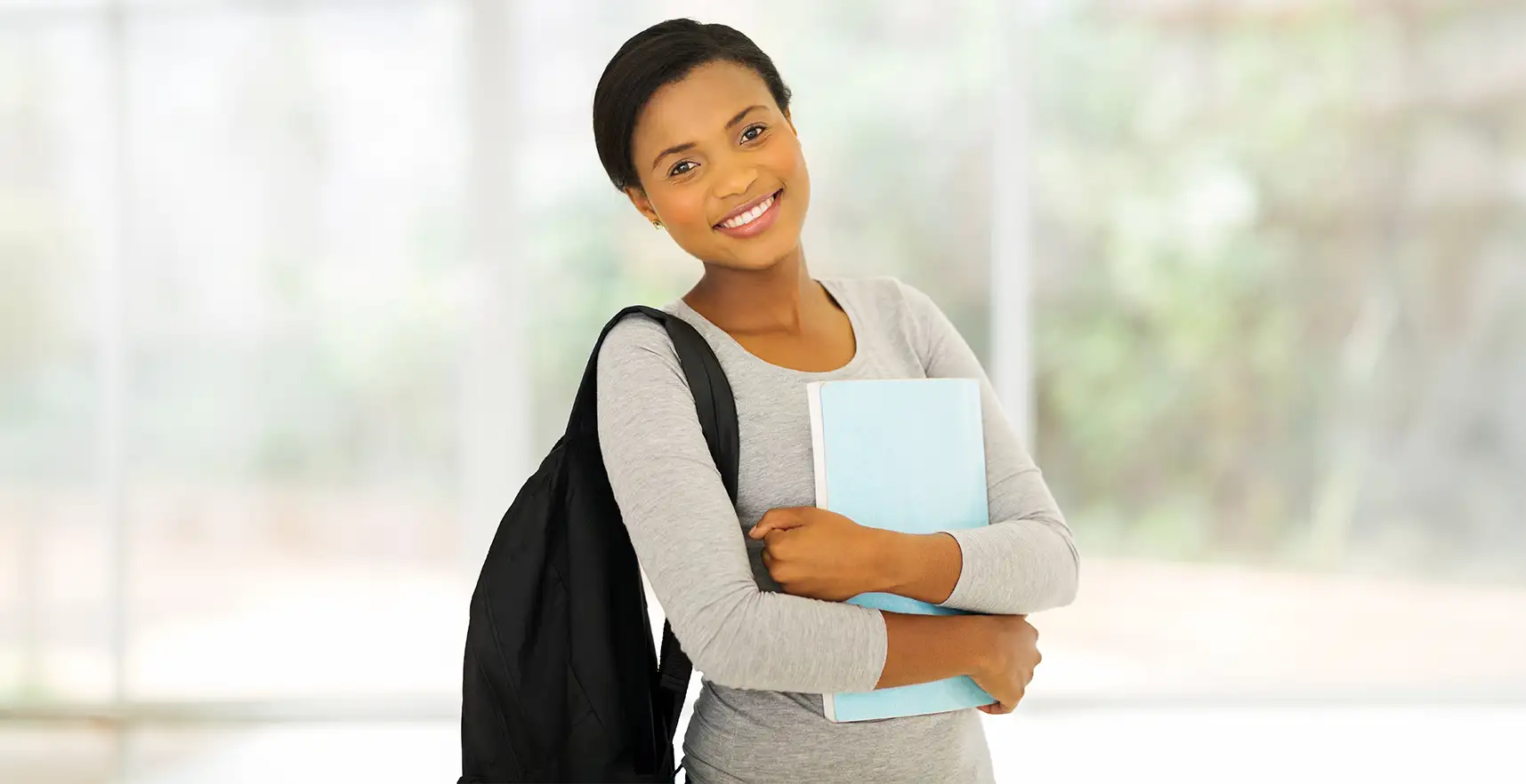 Woman holding textbook